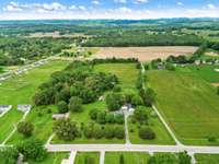 This property spans 8.8 acres and offers ample potential for additional dwellings. 6728 Jim Cummings Hwy Bradyville, TN 37026