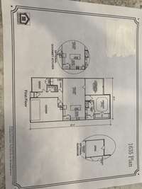 File photo 1 story, 2 bedroom, 2 bath, formal dining room, combo great room, kitchen, covered back porch & patio, Blind package, stainless kitchen package & refrigerator, tile kitchen backsplash, under cabinet lighting, laminate, carpet, tile & more!