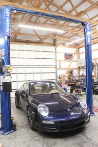 Car Lift In barn.