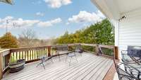 Deck overlooks back yard