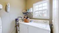 Laundry room is on main level off the kitchen