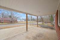 Attached carport and parking pad