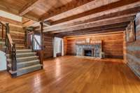 Original log cabin built in 1832, hand-hewn logs, attached to sunroom, gas fireplace