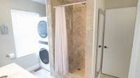 PRIMARY BATHROOM WITH NEW W/D AND VANITY