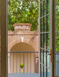Here is a peek at the beautiful garden structure on the terrace from the master bedroom. Notice the antique terracotta pieces on the top and the beautiful cove for the antique planter.