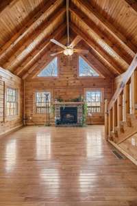 Exposed beams, featuring tall, vaulted ceilings that open up the space.4485 Coconut Ridge Smithville, TN 36166