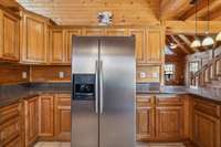 This kitchen does not lack modern amenities complete with a large stainless steel fridge! 4485 Coconut Ridge Smithville, TN 36166