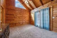 The second bedroom is bright and airy, with plenty of natural light streaming through large windows.  4485 Coconut Ridge Smithville, TN 36166