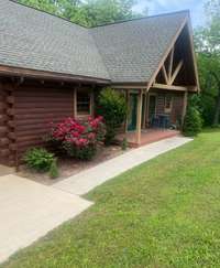 You will love the beautiful flowers at the front of this property! 4485 Coconut Ridge Smithville, TN 36166