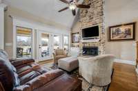 Great room w/ high ceilings, gas fireplace, sand/finish wood floors