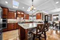 Kitchen w/ huge bar area, s.s. appliances & gas stove