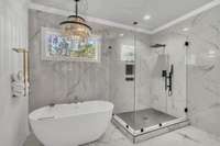 A spa-like tile shower, and a soaking tub