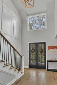 Step inside to discover soaring vaulted ceilings creating an inviting atmosphere