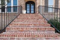 Front Stairs Leading to Custom Iron Front Door