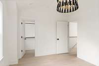 MDF shelving throughout walk-in closet