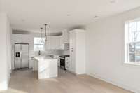Kitchen island with waterfall quartz