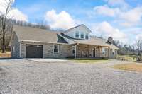Extended garage for increased storage space, pulldown ladder in garage provides access to attic.