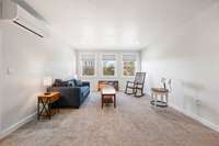 Upstairs bonus room. A great space for reading or movies, or another bedroom.