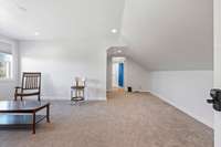 Upstairs bonus room with a full bath.