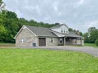Welcome to 744 Dobbins Pike, Gallatin TN. 37075 Sitting on 1.5 acres of Gallatins beautiful county side. A complete Renovated Masterpiece.