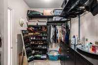 Large walk in primary closet.