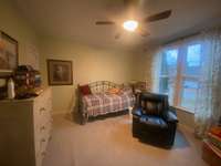 DOWNSTAIRS BEDROOM W/WALKIN CLOSET & ADJACENT TO FULL BATH