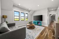 Versatile bonus space! This spacious second-level bonus room is perfect for a media room, play area, or lounge. Upstairs, you'll also find four bedrooms and two full bathrooms, offering comfort and convenience for family and guests.