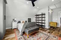Second of four upstairs bedrooms, featuring brand-new custom California Closets, built-in storage, and a cozy window seat with stunning views.