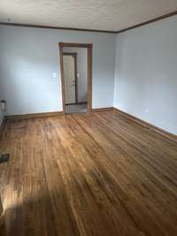Don't You Just Love These Hardwood Floors in the Living Room?