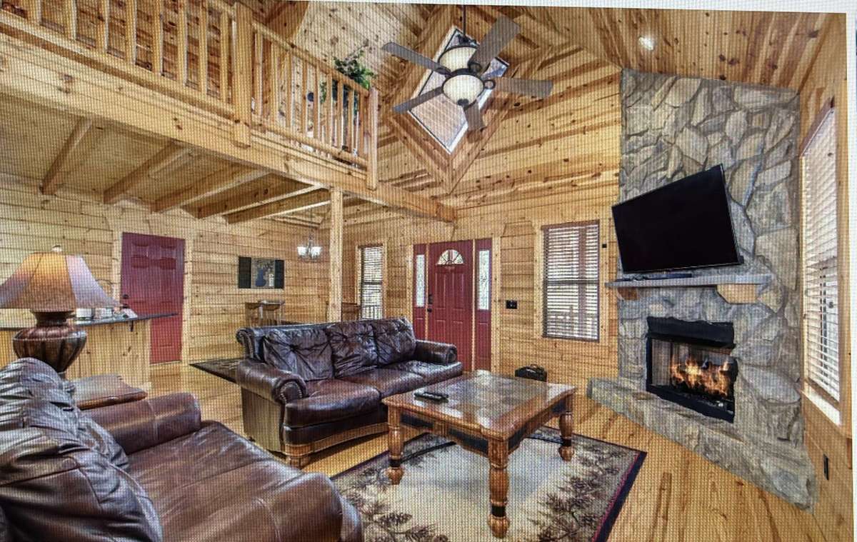 Large stone fireplace adds to that cozy, cabin feel.  Open floorpan...Great Room w/stone fireplace (gas logs) is open to Dining and kitchen areas.
