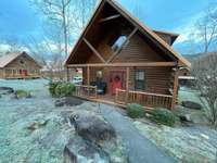 Wintertime...paved walk from designated park to front porch. Only one step onto porch!