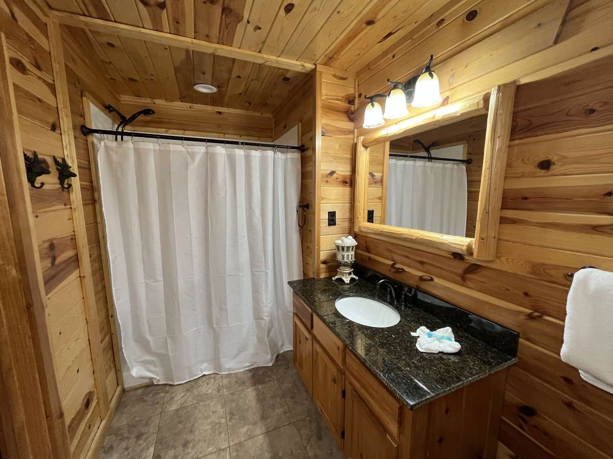 Separate bathroom for 2nd Master bedroom, double sinks and separate shower, toilet.