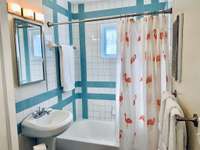 Updated bathroom with retro style tile.