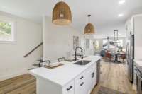 Island storage and serving space for gatherings is plentiful.