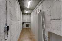 Registered tornado shelter/ safe room on lower level next to kitchen and dining