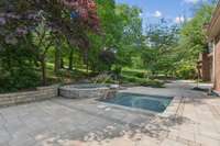 massive stone paved outdoor living space