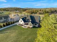 Your home faces North, towards the winding country Maxwell Ln