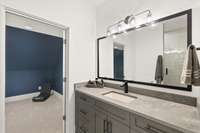 En suite bath & gaming/hobby room....great space for a guest suite and office, too