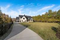 Expansive back yard is fenced and gated for fur babies, children, and privacy....oh and you can go ahead and put in your dream pool now!
