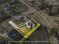 Homes faces Maxwell but has private access from Stillwind Ct for ultimate privacy