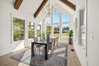 This eat-in dining is great for every day meals and entertaining large groups. Soaring vaulted ceilings. Two story windows. Show off in this space or nestle in for family meals.