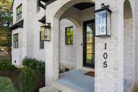 Beautiful covered front porch, with classic lines, and a stately modern stance.