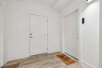 Your front door entrance and the door to the left is for extra storage .