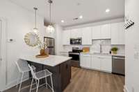 Pretty light fixtures and recessed lighting.