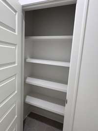 MDF shelving in the linen closet