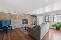 Walk-out Basement w/ Eat-In Kitchen, Living Area with Fireplace, Bedroom, and Full Bath that could be used as a separate rental unit with no step entry.
