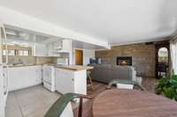 Walk-out Basement w/ Eat-In Kitchen, Living Area with Fireplace, Bedroom, and Full Bath that could be used as a separate rental unit with no step entry.
