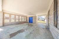 Carport with storage room