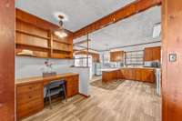 Built-in office area and kitchen combo