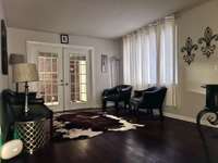 Welcome to this cozy vintage cottage ! Front entrance to sitting room.